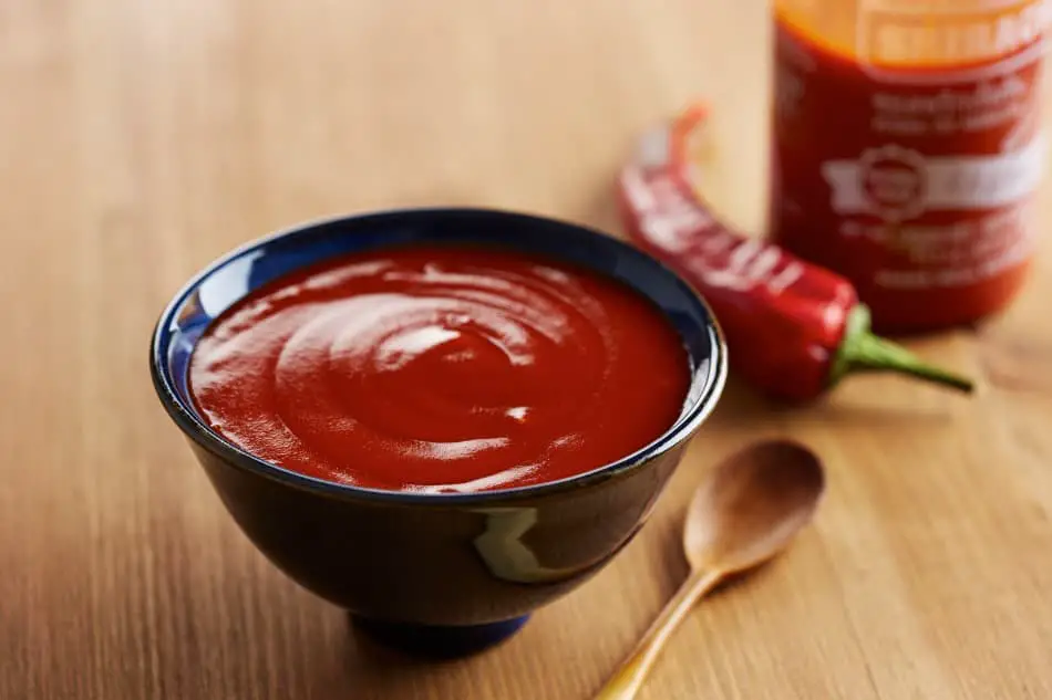 Bowl of red Sriracha hot sauce