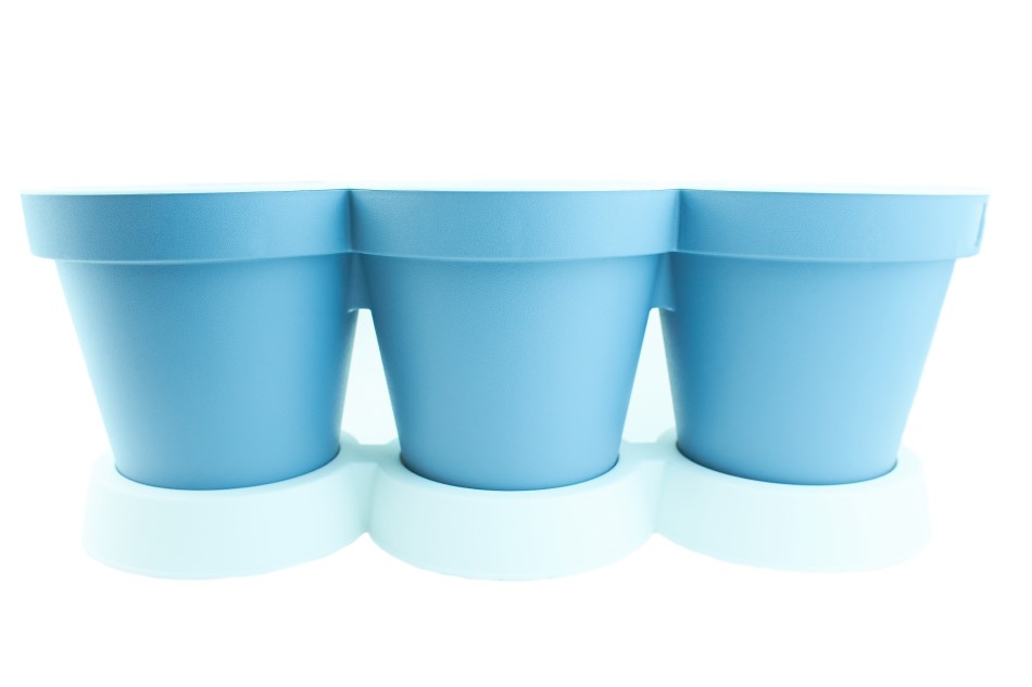 Photo of empty blue plastic plant pots