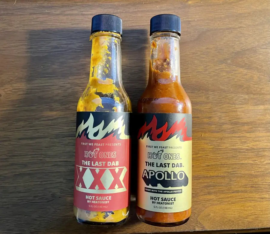 Photo comparing The Last Dab Triple X and Last Dab Apollo Hot Sauces side by side