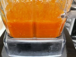 Close up of hot sauces being blended