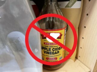 Apple cidar vinegar with a circle and line through it